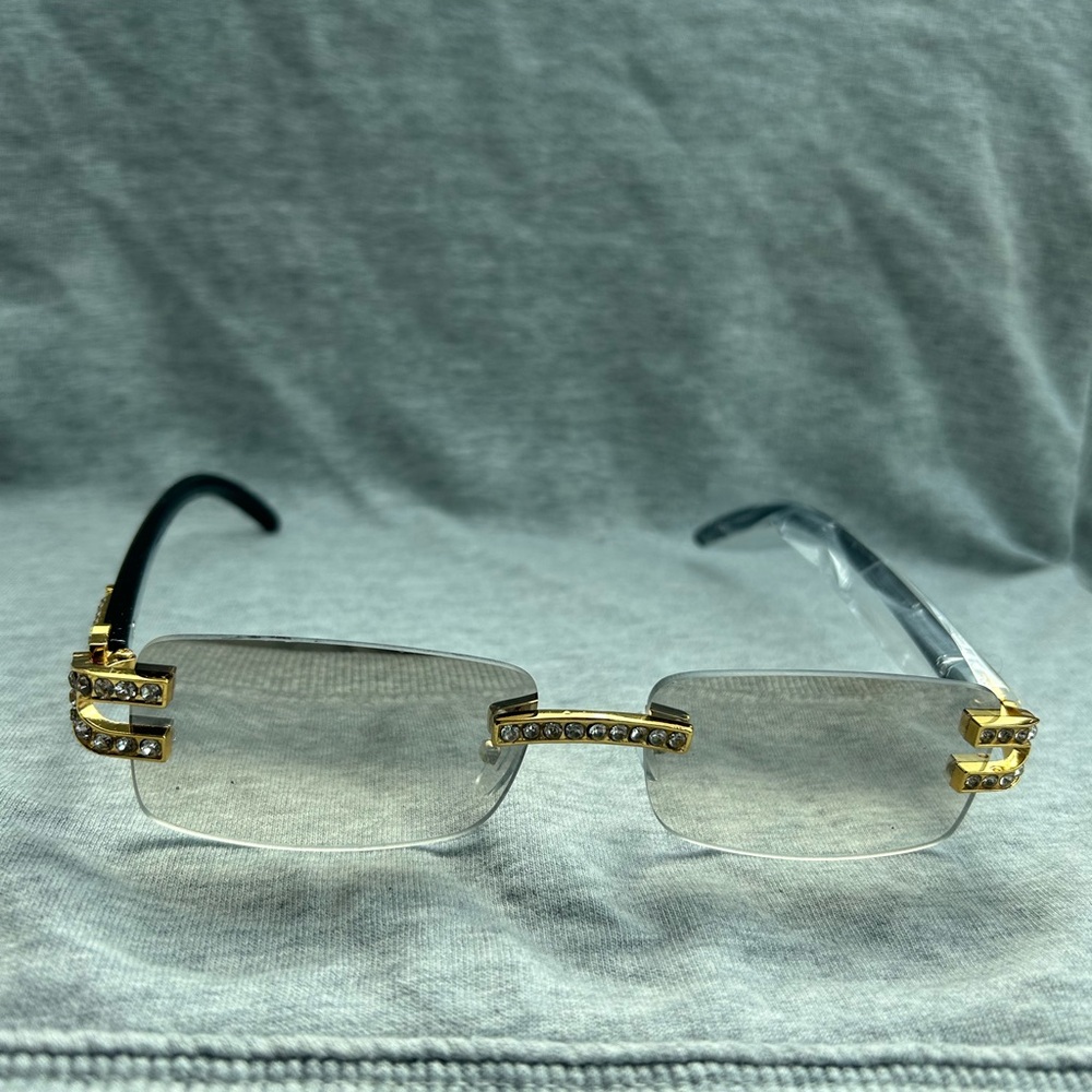 Gold and Black Rimless Sunglasses